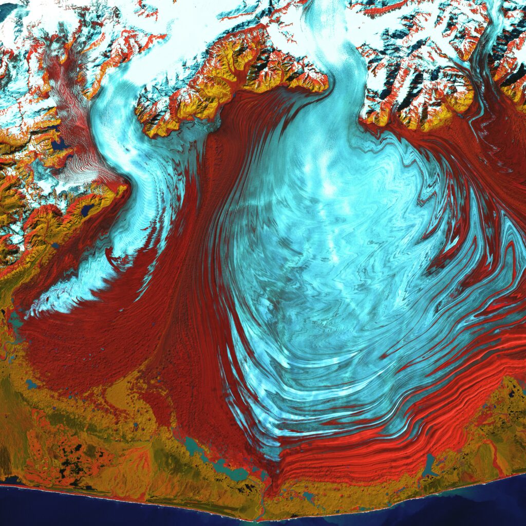 usgs-lR64CdOHZhg-unsplash Loftmynd af landslagi. Landið er rautt